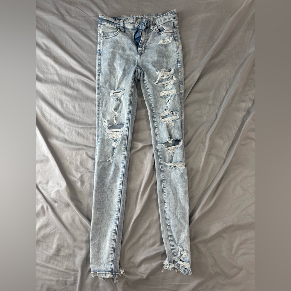 Blue Distressed Super High Rise American Eagle Jegging